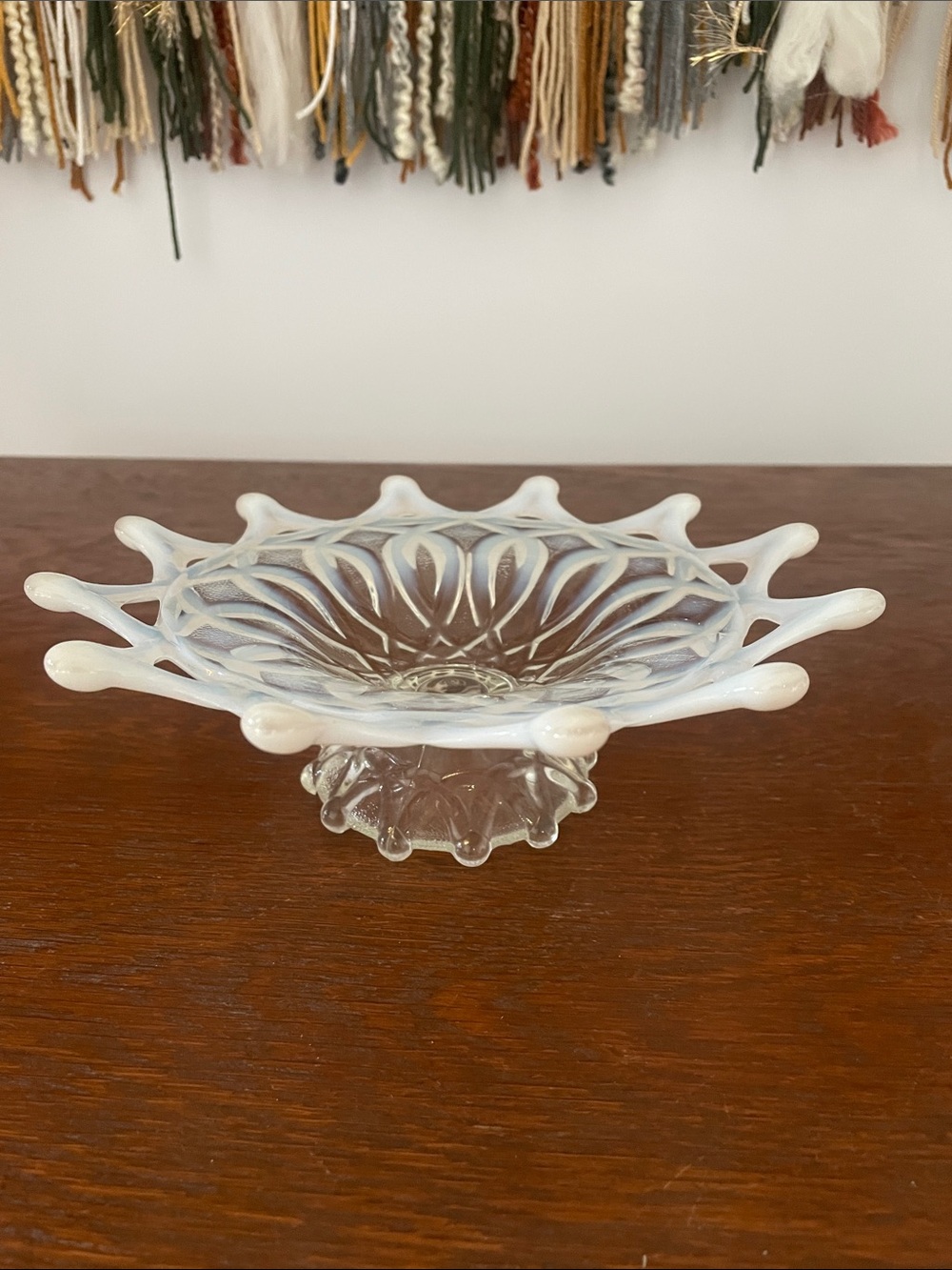 Opalescent pearl dish with intricate design